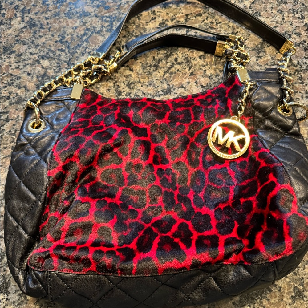 Michael Kors quilted leather and calf hair bag.